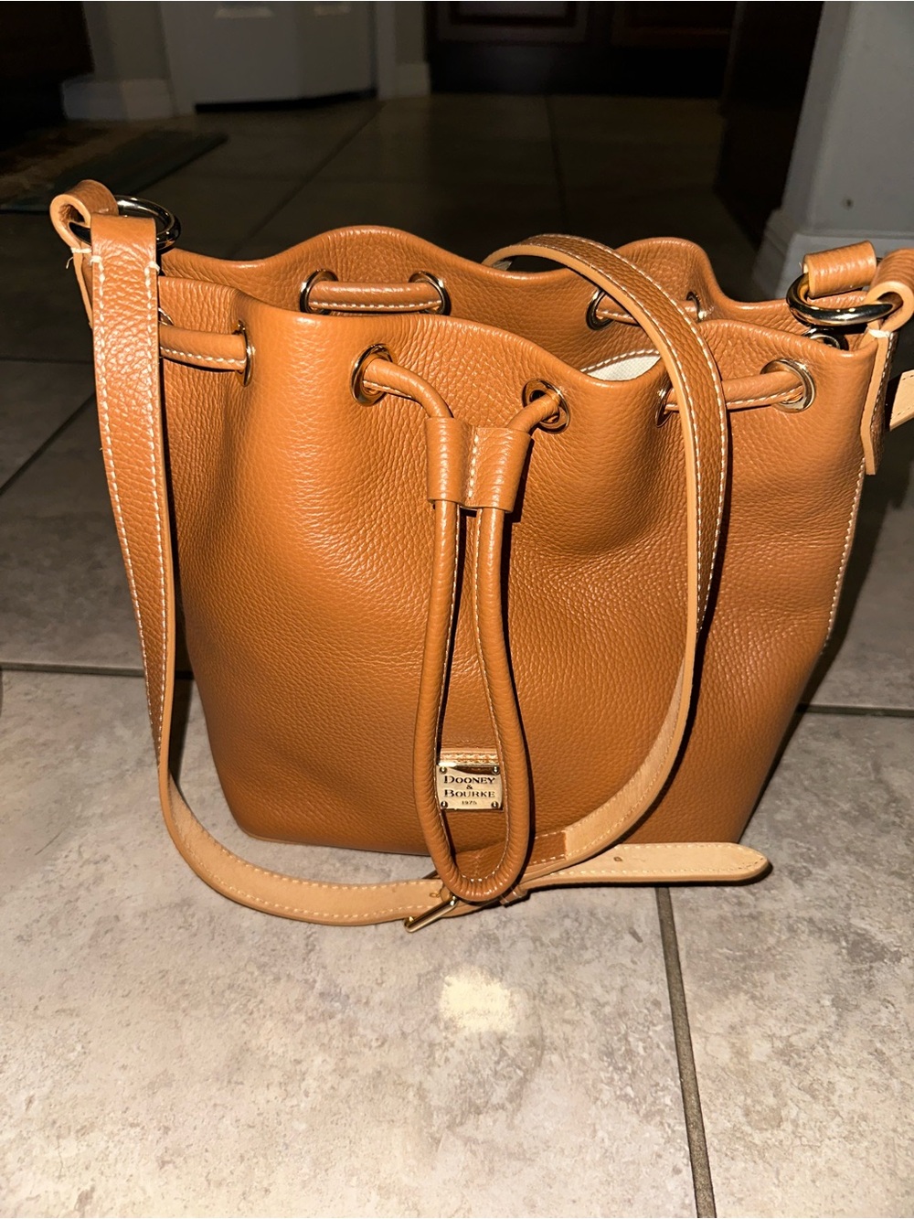 Dooney & Bourke Tan Pebble Leather Drawstring Crossbody